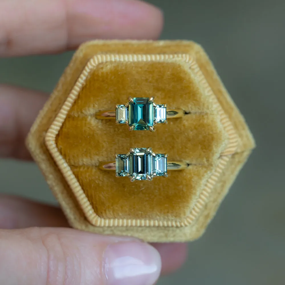 1.30ct Emerald Cut Madagascar Sapphire and  0.98ctw Montana Sapphire Three Stone Low Profile Ring in 18k Yellow Gold