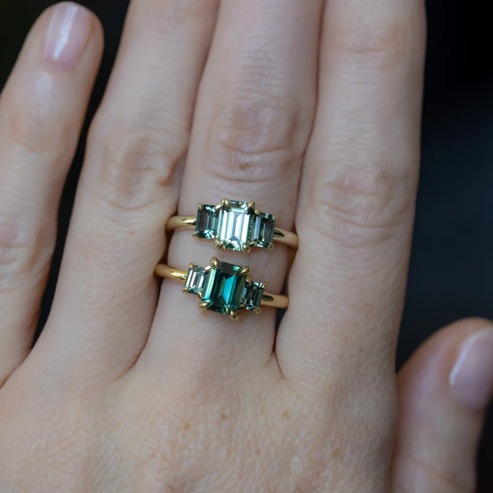 1.30ct Emerald Cut Madagascar Sapphire and  0.98ctw Montana Sapphire Three Stone Low Profile Ring in 18k Yellow Gold