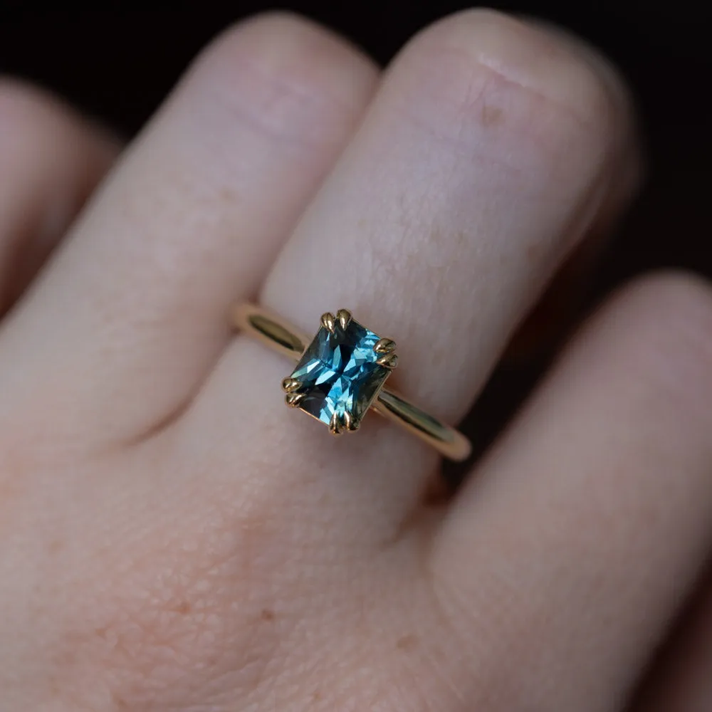 1.68ct Radiant Cut Ocean Blue Teal Sapphire Cathedral Double Prong Solitaire in 18k Yellow Gold