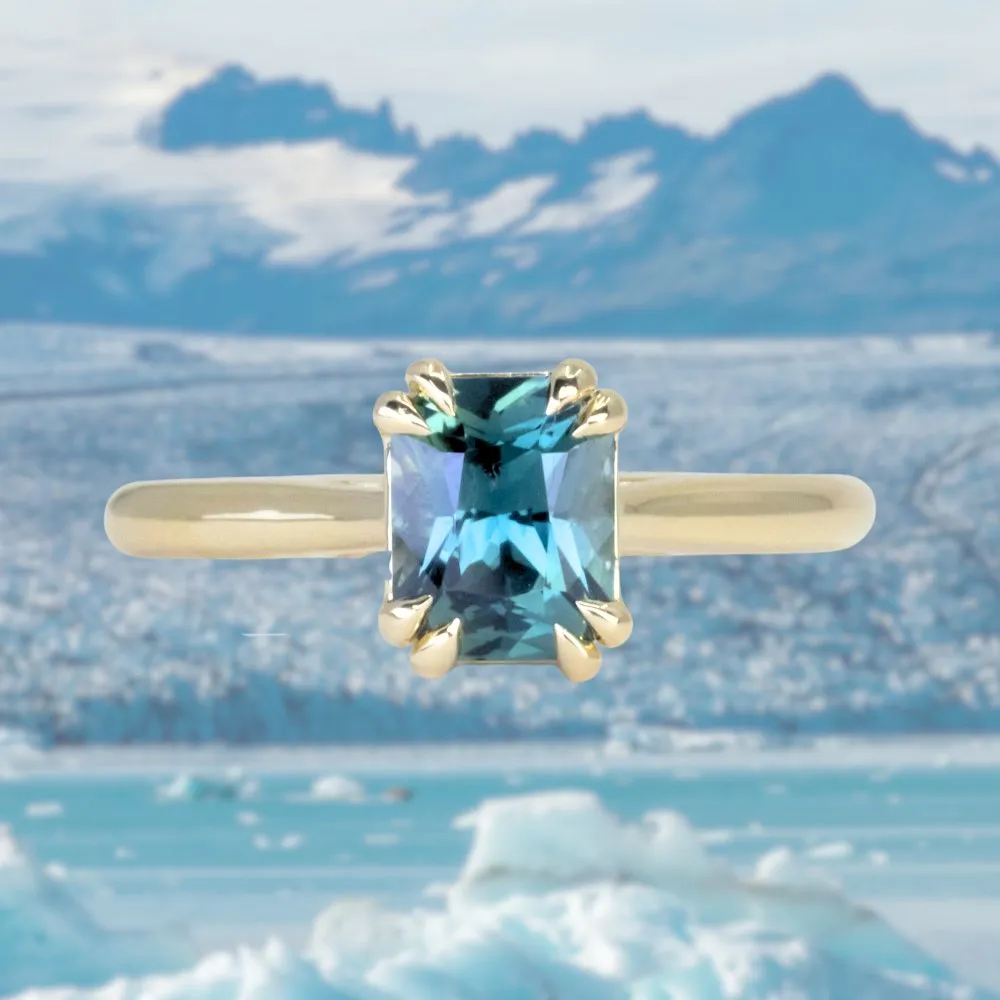 1.68ct Radiant Cut Ocean Blue Teal Sapphire Cathedral Double Prong Solitaire in 18k Yellow Gold