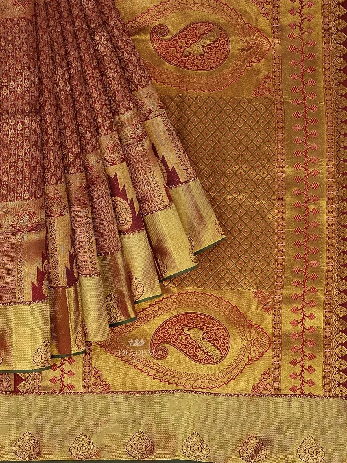 Brown Pure Kanchipuram (Bridal) Silk Saree with Paisley Motif on the body and Dense Zari Border